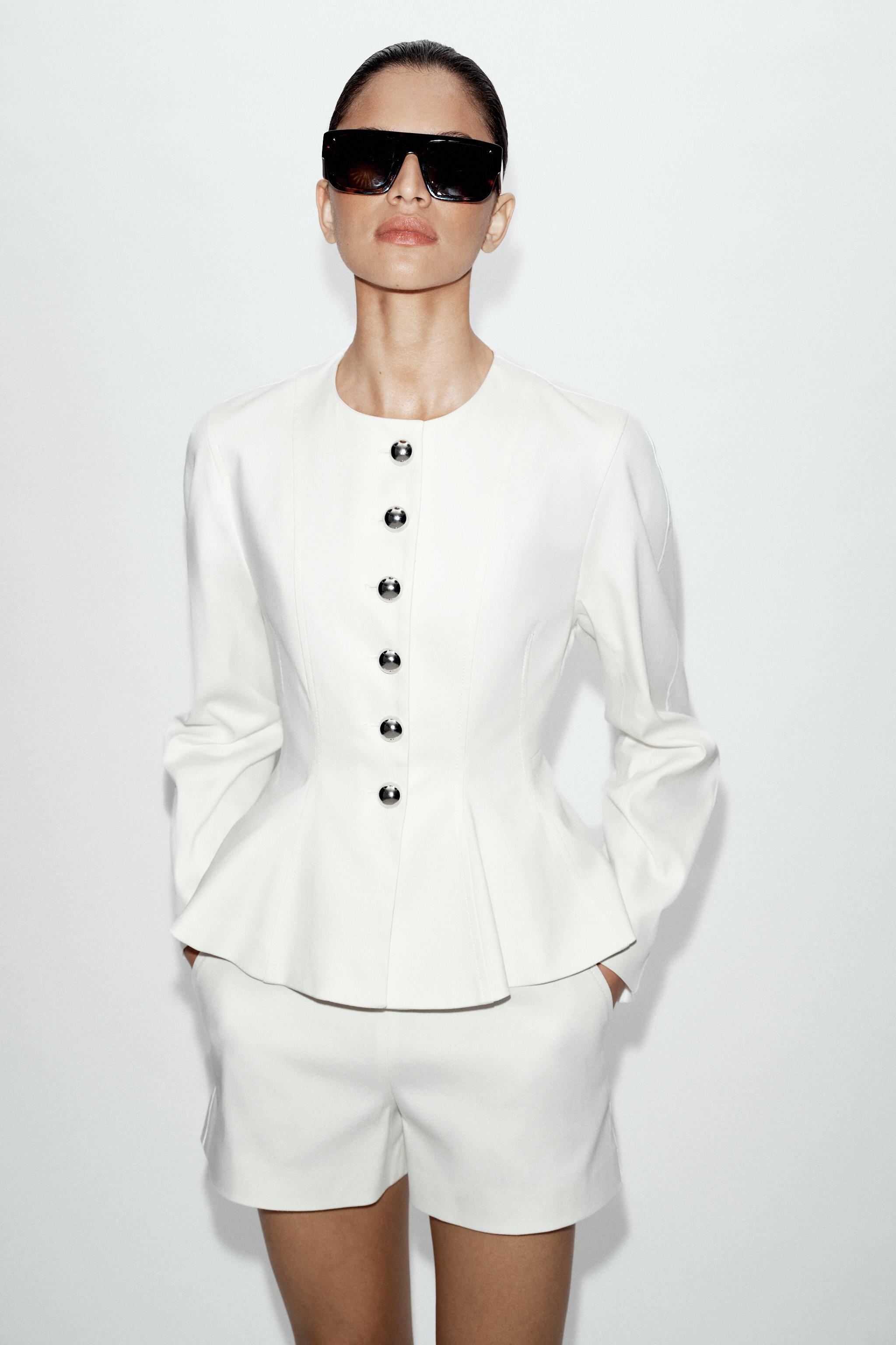 VESTE PEPLUM BOUTONS MÉTALLIQUES